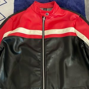 A SHEIN jacket that obviously has 3 colors (red,cream/white,black) size large.